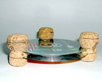 cul coaster made of used wine bottle corks and old cd